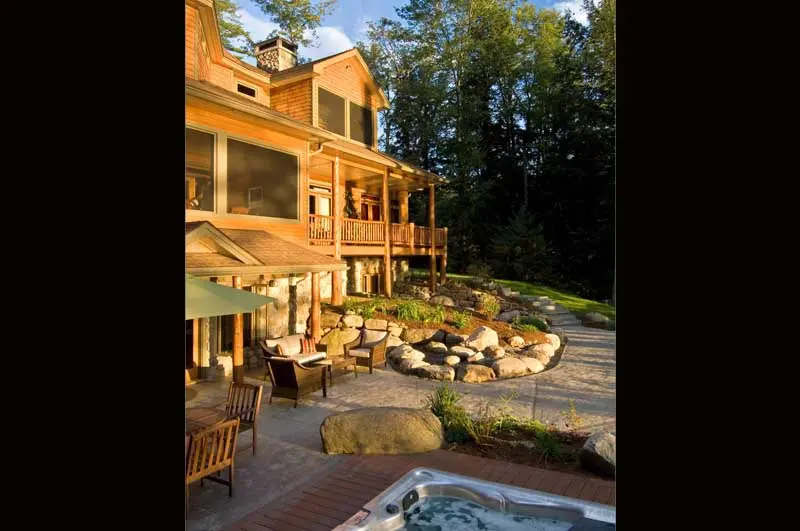 Patio area with hot tub