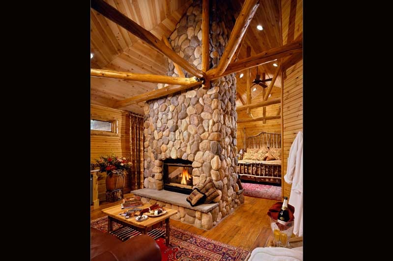 Stone fireplace in suite