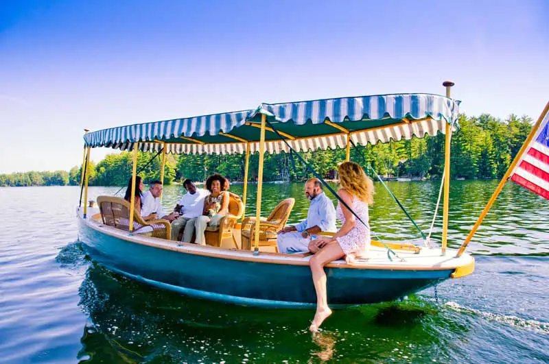 group out on boat on lake