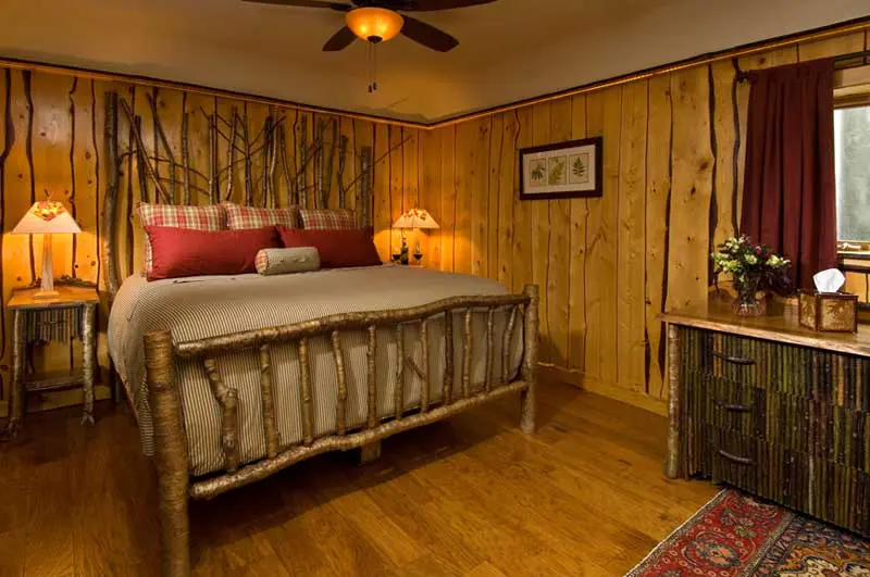 bedroom with birch Adirondack style bed