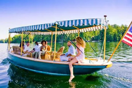 couples on a boat on a lake